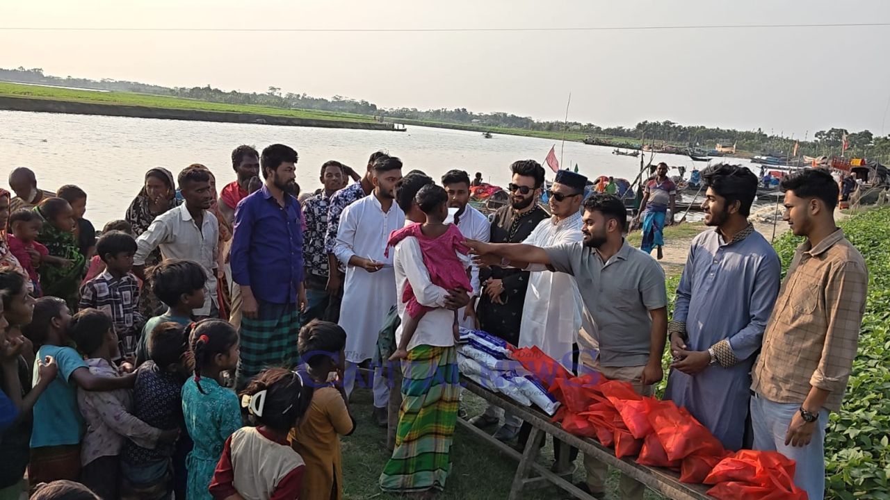 Chhatra Dal Stands beside Children of Floating Fisher Families