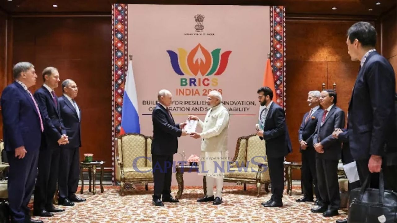 Putin, Modi embrace before talking trade, energy and defence